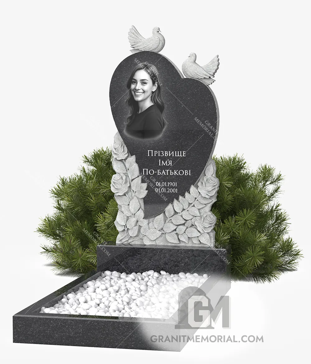 Памятник сердце с голубями