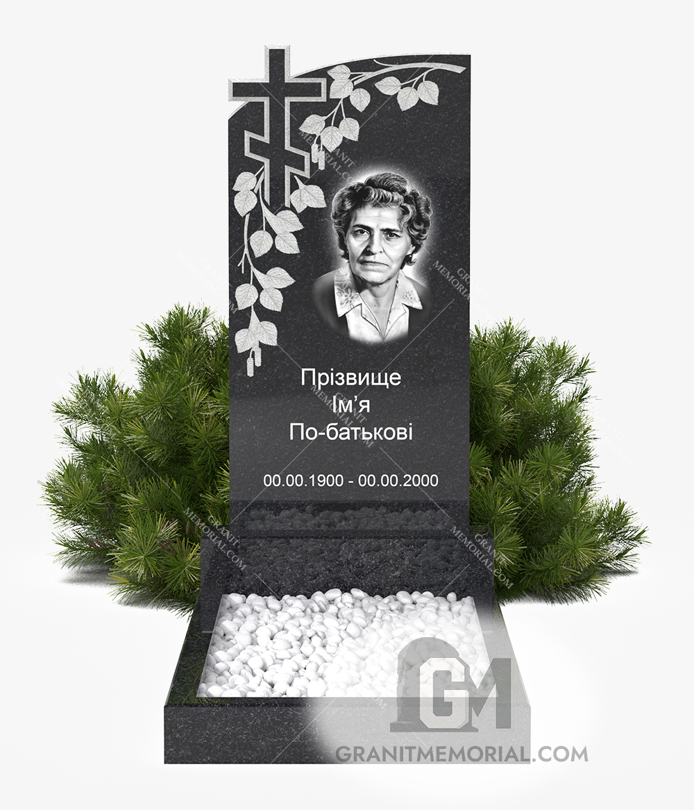 Памятник с резным крестом и ветвью